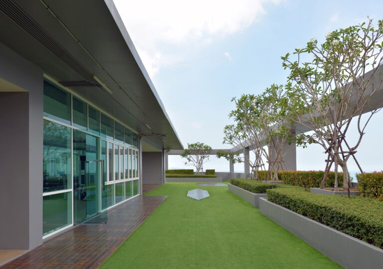 sky garden on rooftop of condominium with blue sky